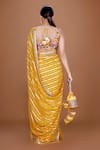 Shop_Neeta Lulla_Yellow Organza Woven Stripe Scoop Neck Urja Saree With Blouse _at_Aza_Fashions