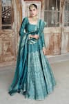 Buy_Safaa_Blue Vegan Silk Woven Floral Buttis Square Mirea Peacock Lehenga Set _at_Aza_Fashions