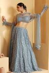 Buy_MeenaGurnam_Blue Net Hand Embellished Sequins Round Neck Flower Vine Lehenga Set _at_Aza_Fashions