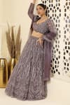 MeenaGurnam_Purple Net Embroidery Glitter Cutwork Scoop Neck Abstract Sequin Lehenga Set _Online_at_Aza_Fashions