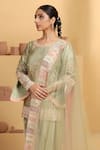 MeenaGurnam_Green Moga Silk Embroidery Floral Round Neck Motif Pattern Kurta Pant Set _at_Aza_Fashions