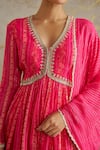 Chhavvi Aggarwal_Pink Lurex Georgette Printed Floral V-neck Peplum Sharara Set _at_Aza_Fashions