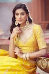 Shop_Azeera_Yellow Silk Blend Embroidered Floral Plunged Neck Lehenga Set _at_Aza_Fashions