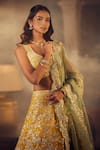 Shop_Azeera_Yellow Embroidered Floral Vines Glass Neck Mukesh Lehenga Set _Online_at_Aza_Fashions