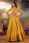 Shop_Azeera_Yellow Embroidered Floral Plunged Sweetheart Navrantan Lehenga Set _Online