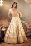 Buy_Azeera_Ivory Embroidered Floral Plunged Leaf Neck Prachi Zardozi Bridal Lehenga Set 