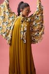 Shop_Nikasha_Yellow 100% Modal Silk Satin Print Rosa Tie Up Collar Neck Cape Dress _at_Aza_Fashions