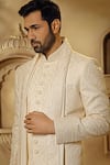 Shop_Vanshik_Off White Raw Silk Embroidered Resham Floral Swirl Sherwani Pant Set _Online_at_Aza_Fashions