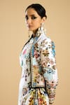 Rajdeep Ranawat_Ivory Dutches Satin Print Gardenia Stand Collar Neck Embellished Bolero Jacket _at_Aza_Fashions