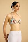 Rajdeep Ranawat_Ivory Poly Lycra Print French Blossom Halter Neck And Embellished Bralette _at_Aza_Fashions