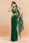 Buy_Amit Aggarwal_Emerald Green Embellished Cutdana Metallic Ruffled Pre-draped Saree With Blouse _at_Aza_Fashions