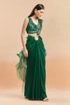 Amit Aggarwal_Emerald Green Embellished Cutdana Metallic Ruffled Pre-draped Saree With Blouse _at_Aza_Fashions