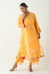 Buy_Shivani Bhargava_Yellow Silk Stripe Tissue Handwoven Zari V-neck Mira Choga Kurta _at_Aza_Fashions