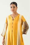 Shivani Bhargava_Yellow Cotton Silk Hand Embroidered Thread Notched Isha Kurta _Online_at_Aza_Fashions