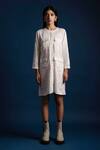 Buy_Khajoor Studio_White Linen Beads Round Neck Candle Short Pocket Dress _at_Aza_Fashions