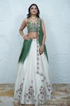 Buy_Zardozi Zari_Green Raw Silk Embroidery Zardozi Sweetheart Neck Tulip Bloom Lehenga Set _at_Aza_Fashions