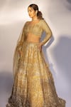 Buy_mehar_Gold Soft Net Embroidered Sequin Sweetheart Bridal Lehenga Set _at_Aza_Fashions