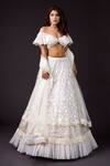 Buy_Archana Kochhar_Ivory Net Embroidery Floral Asymmetric Neck Pearl Lehenga Set _at_Aza_Fashions