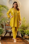 Buy_OMI_Green Silk Embroidery Floral V-neck Sequin High Low Kurta With Straight Pant _at_Aza_Fashions