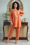 Buy_OMI_Orange Silk Embroidery Floral V-neck Sequin Asymmetric Kurta With Pant _at_Aza_Fashions