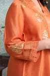 Shop_OMI_Orange Silk Embroidery Floral V-neck Sequin Asymmetric Kurta With Pant _Online_at_Aza_Fashions