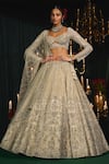 Buy_Roqa_Ivory Net Embroidery Zari Sweetheart Neck Mahreen Sequin Bridal Lehenga Set _Online_at_Aza_Fashions