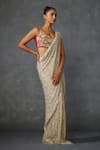 Namrata Joshipura_Beige Shimmer Crepe Embroidered Autumn Bloom Godet Pre-draped Saree With Blouse _Online_at_Aza_Fashions