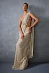 Namrata Joshipura_Beige Shimmer Crepe Embroidered Autumn Bloom Godet Pre-draped Saree With Blouse _at_Aza_Fashions