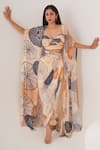 Shop_LABEL SHRISTI CHETANI_Peach Natural Crepe Embellished Bead Cape Open Abstract Motif Draped Skirt Set _Online_at_Aza_Fashions