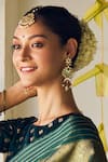 Buy_MAISARA JEWELRY_Green Pearl Ishya Kundan Floral Embellished Earrings _at_Aza_Fashions