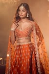 Azeera_Orange Embroidered Floral Leaf Neck Zeenath Bridal Lehenga Set 