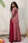 Shop_Raas Life_Maroon Handwoven Chanderi Striped Amala Flared Pant _at_Aza_Fashions