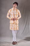 Buy_Aryavir Malhotra_Yellow Soft Cotton Print Tie Dye Swerve Bundi Kurta Set _at_Aza_Fashions