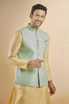 Aryavir Malhotra_Green Jacquard Woven Flower Nehru Jacket _at_Aza_Fashions