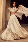 Shop_LASHKARAA_Off White Blouse And Lehenga Brocade Woven Floral V Neck Set _Online_at_Aza_Fashions