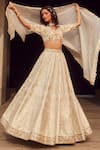 LASHKARAA_Off White Blouse And Lehenga Brocade Woven Floral V Neck Set _at_Aza_Fashions