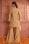 Shop_Tasuvure Indes_Yellow Georgette Embroidered Paisley Notched Round Elizey Kurta With Sharara _at_Aza_Fashions