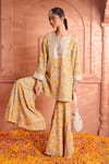 Tasuvure Indes_Yellow Georgette Embroidered Paisley Notched Round Elizey Kurta With Sharara _Online_at_Aza_Fashions