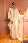 Buy_Tasuvure Indes_Ivory Tissue Silk Embroidered Thread V-neck Inayat Floral Vine Kurta Pant Set _at_Aza_Fashions