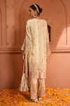 Shop_Tasuvure Indes_Ivory Tissue Silk Embroidered Thread Notched Sequin Geometric Kurta With Pant _at_Aza_Fashions