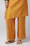 Pants and Pajamas_Yellow Kurta Silk Chanderi Embroidered Sequin Round Paisley Yoke Pant Set _at_Aza_Fashions