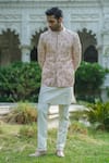 Amrit Dawani_Rose Gold Bandhgala Raw Silk Embroidered Thread Zardozi Floral Trouser Set _Online_at_Aza_Fashions