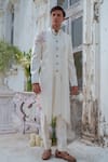 Buy_Amrit Dawani_Ivory Cape Kurta Modal Silk Hand Painted Floral Open Attached With Trouser _at_Aza_Fashions