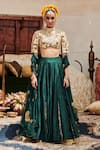 Buy_Itrh_Green Lehenga Raw Silk Zamurd Lampi Layered Godet Set With Mirrorwork Blouse _at_Aza_Fashions