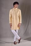 Buy_Aryavir Malhotra_Gold Silk Blend Patchwork Paisley Kurta With Churidar _at_Aza_Fashions