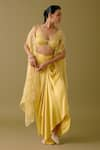 Buy_Devnaagri_Yellow Silk Satin Embroidery Dori Blossom And Sequin Cape & Draped Skirt Set _at_Aza_Fashions