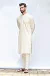 Priyanka Jain_Ivory Cotton Silk Embroidery Gota Diagonal Stripe Kurta Set _Online_at_Aza_Fashions