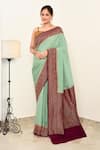 Buy_Naaritva India_Green Crepe Handwoven Flower Veil Contrast Hem Saree With Running Blouse _at_Aza_Fashions