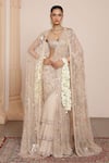 Shop_Arpita Mehta_Ivory Net Embroidered Thread Floral Mirror Pre-draped Saree With Blouse _at_Aza_Fashions