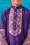 CUTE COUTURE_Purple Silk Print Ethnic Motif Folklore Patch Kurta With Dhoti Pant _at_Aza_Fashions